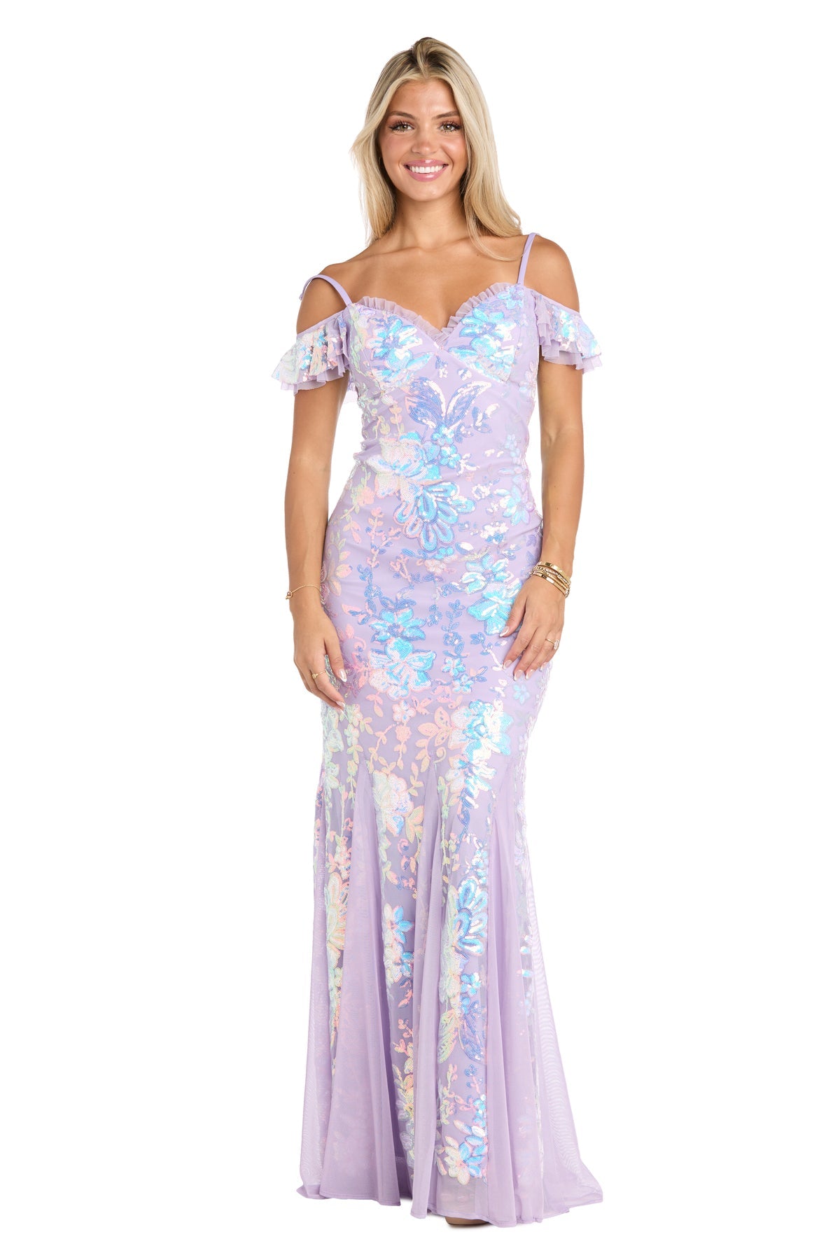 A woman poses and smiles against a white background, wearing the Lilac Sequin-Print Long Prom Dress: Morgan 19064.